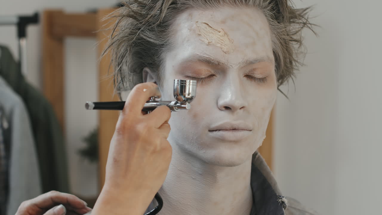 Applying Zombie Makeup on Face of Male Actor