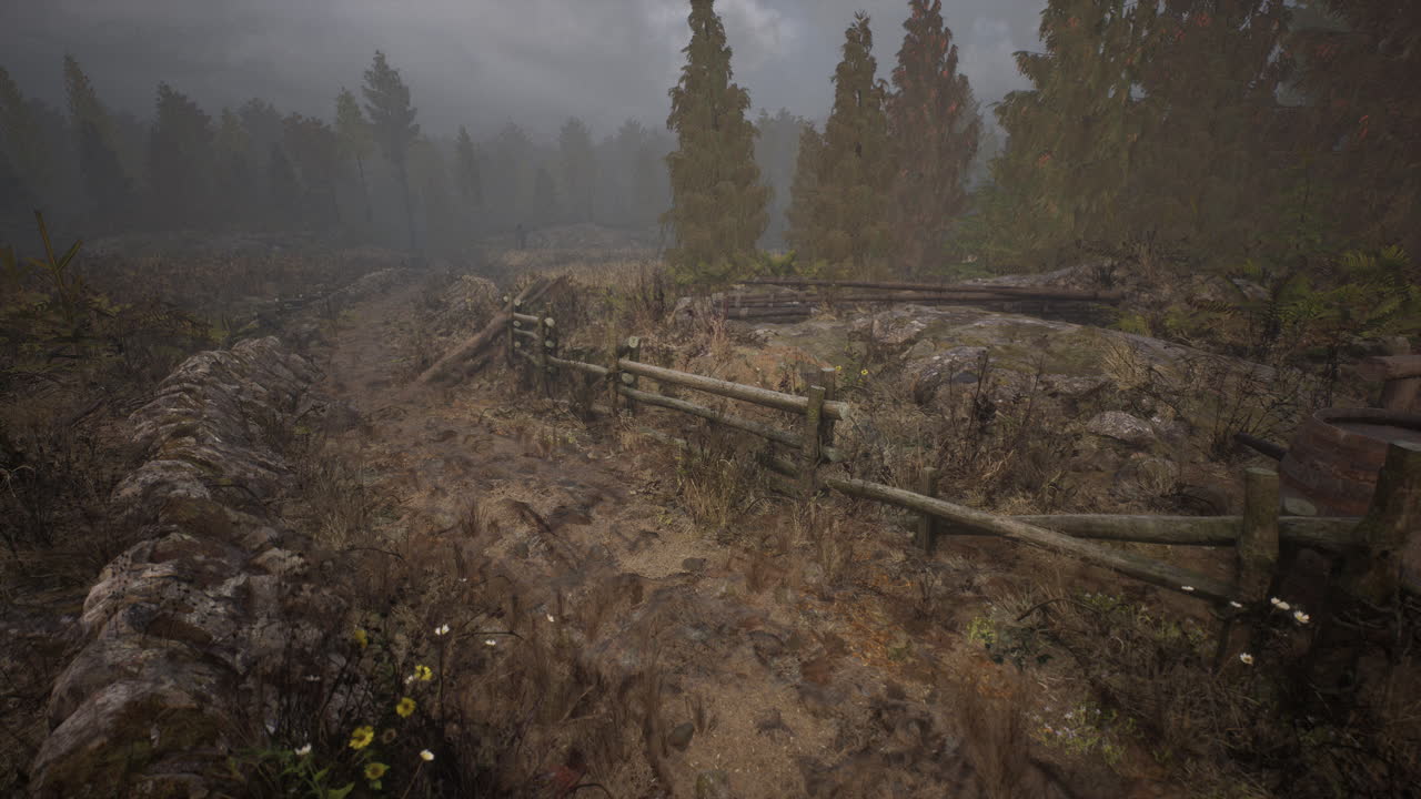 una vieja valla de madera con un campo de campo detrás de ella