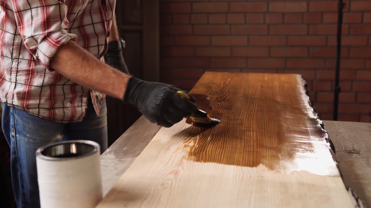 Applying Wood Stain to a Wooden Plank