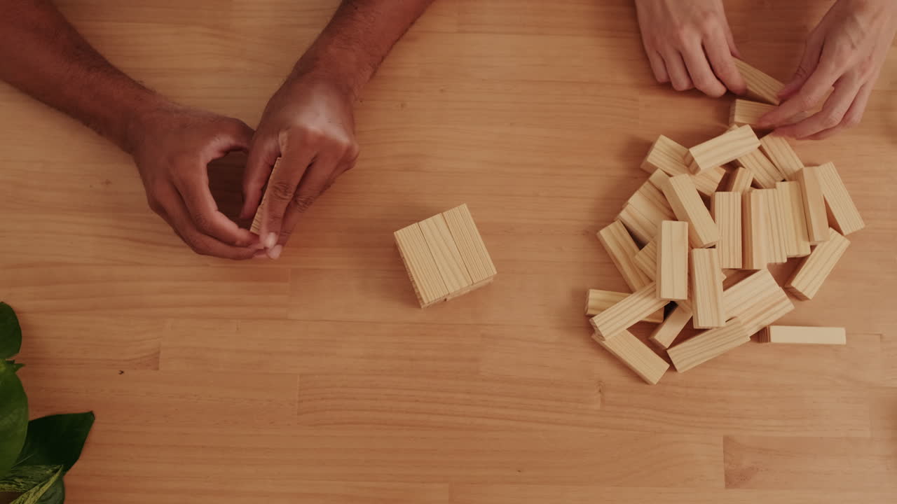 Couple Playing Jenga at Home