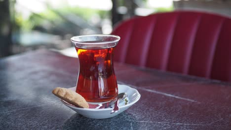 turkish tea and cookie on a table