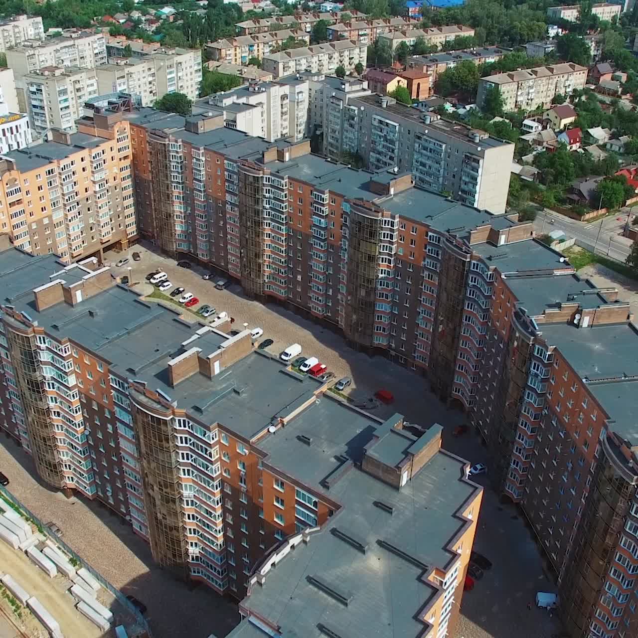 Beautiful architecture in the city. Modern district with newly built apartments in the downtown. Urban background from the air. Aerial view.