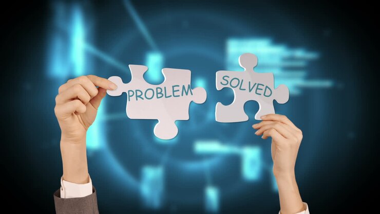 Hands holding puzzle pieces