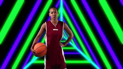 Animation-of-african-american-female-basketball-player-with-ball-over-shapes