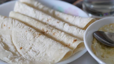 indian breakfast with roti and egg