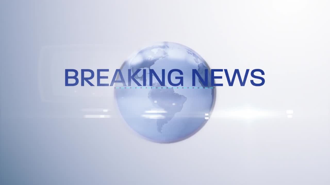 Animation af ordene Breaking News skrevet med globus i baggrunden