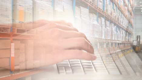 Animation-of-man-typing-on-laptop-keyboard-with-stacks-of-boxes-in-warehouse