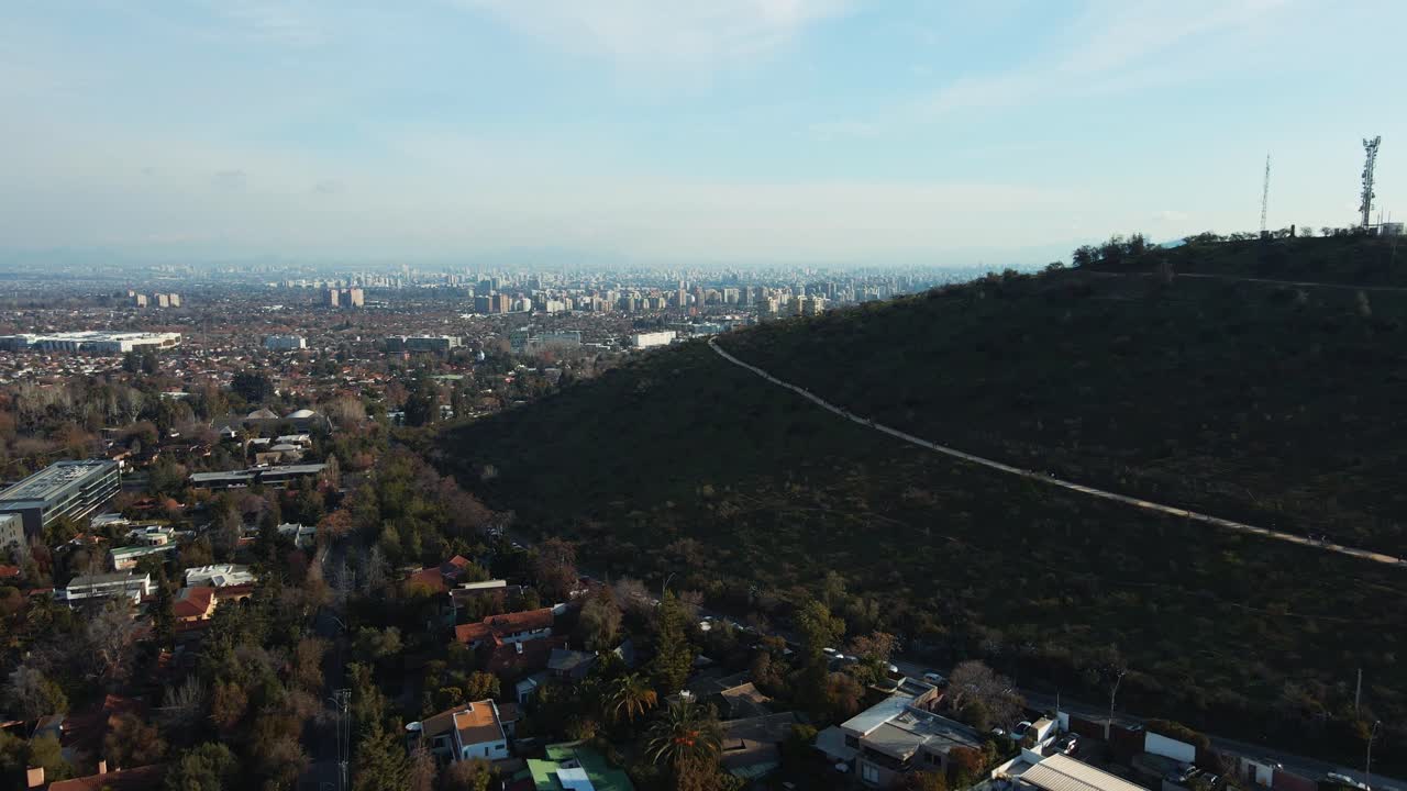 observatorio y parque natural de cerro calán con casco urbano de las condes, santiago, chile