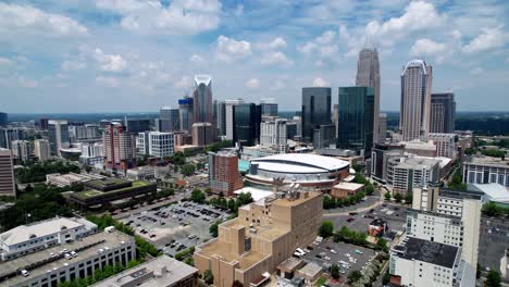 aerial push into charlotte nc skyline with the spectrum center in the foreground, charlotte north carolina