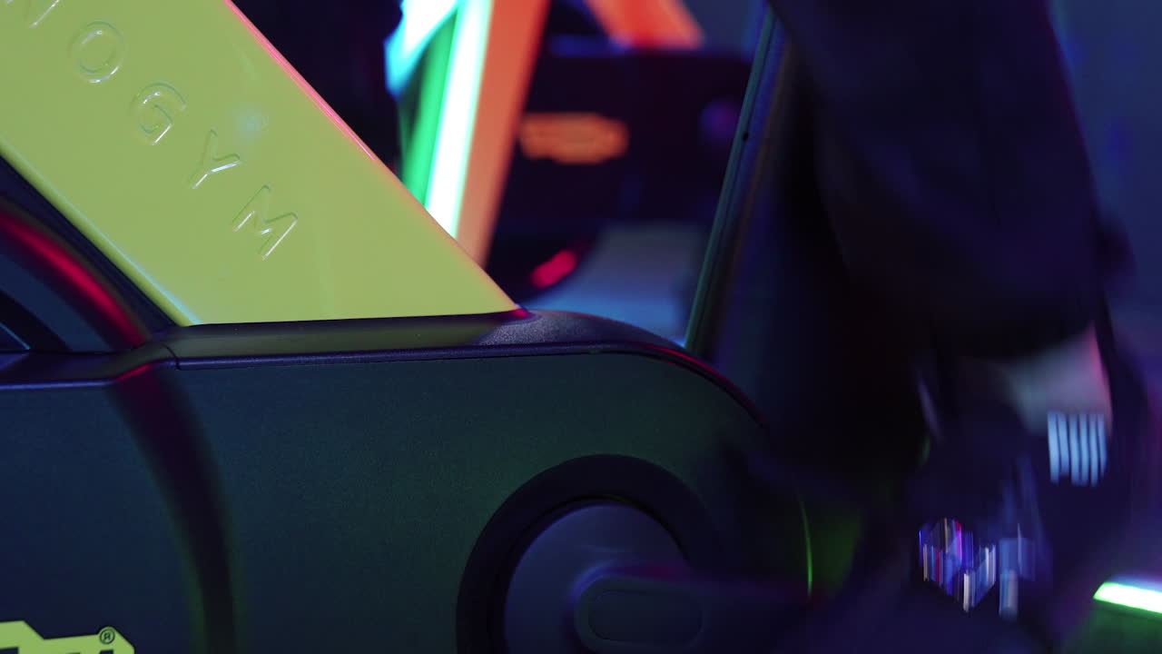 Cardio training on stationary bike. Sport gym man exercise with cycling machine in gym