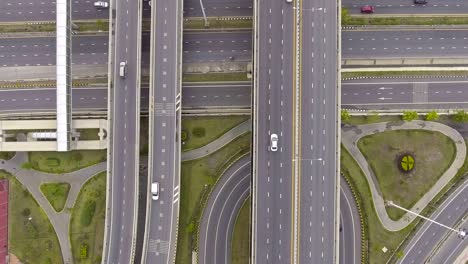 aerial top view of traffic on highway and circle in bangkok thailand, aerial footage