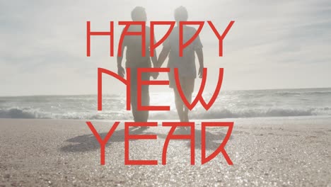 Animation-of-happy-new-year-text-over-senior-biracial-couple-at-beach