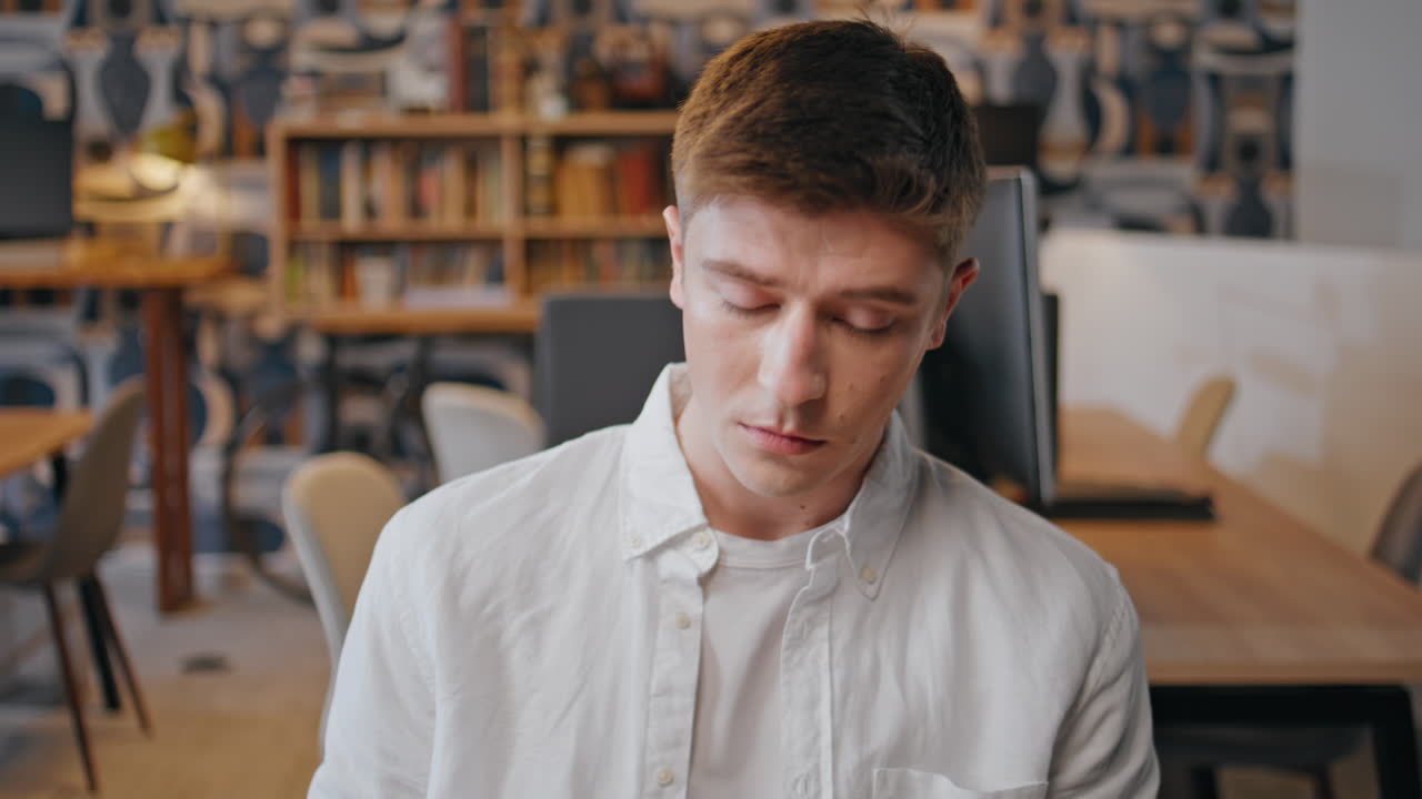 Serious worker writing notes in notebook sitting office closeup. Man noting