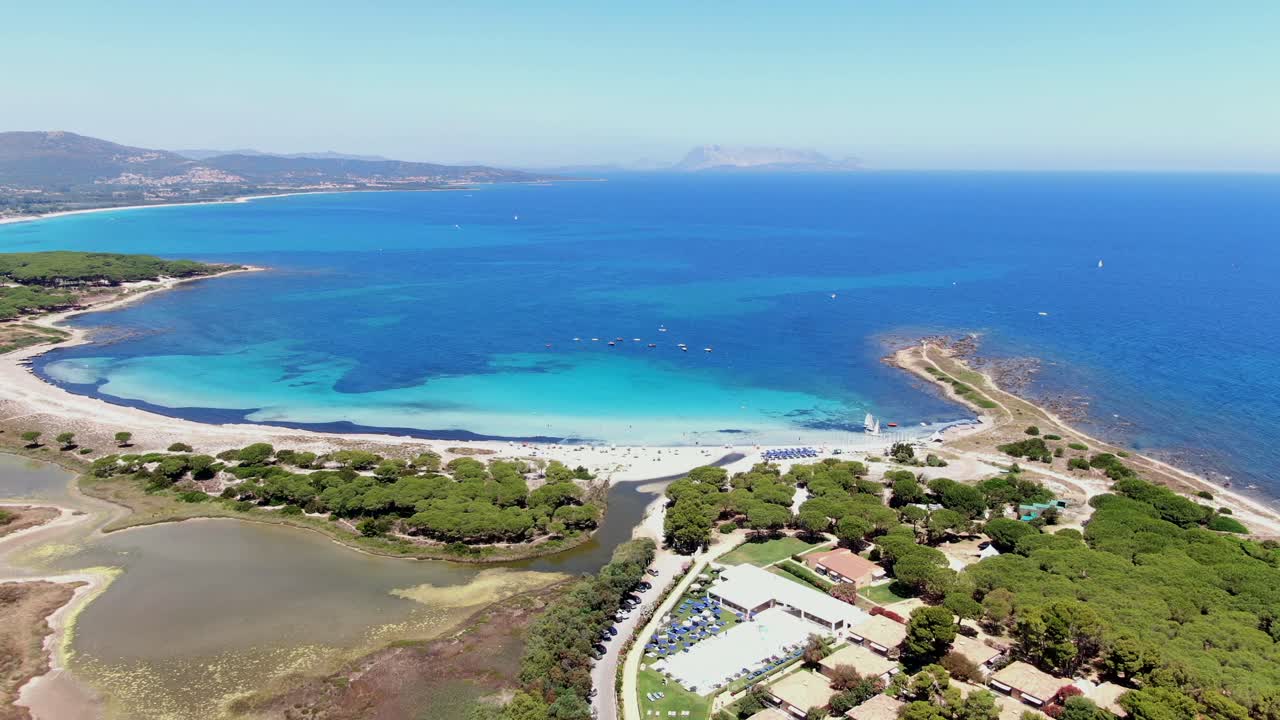 Aerial view of the beach, pan left