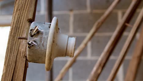 Remains-of-an-old-smoke-detector-in-an-abandoned-motel-in-North-Carolina