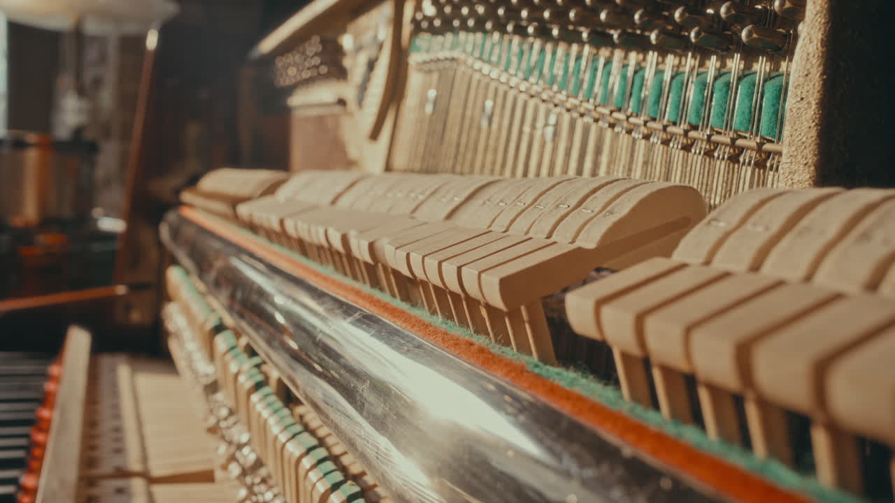 Close-up view of a vintage piano's action mechanism