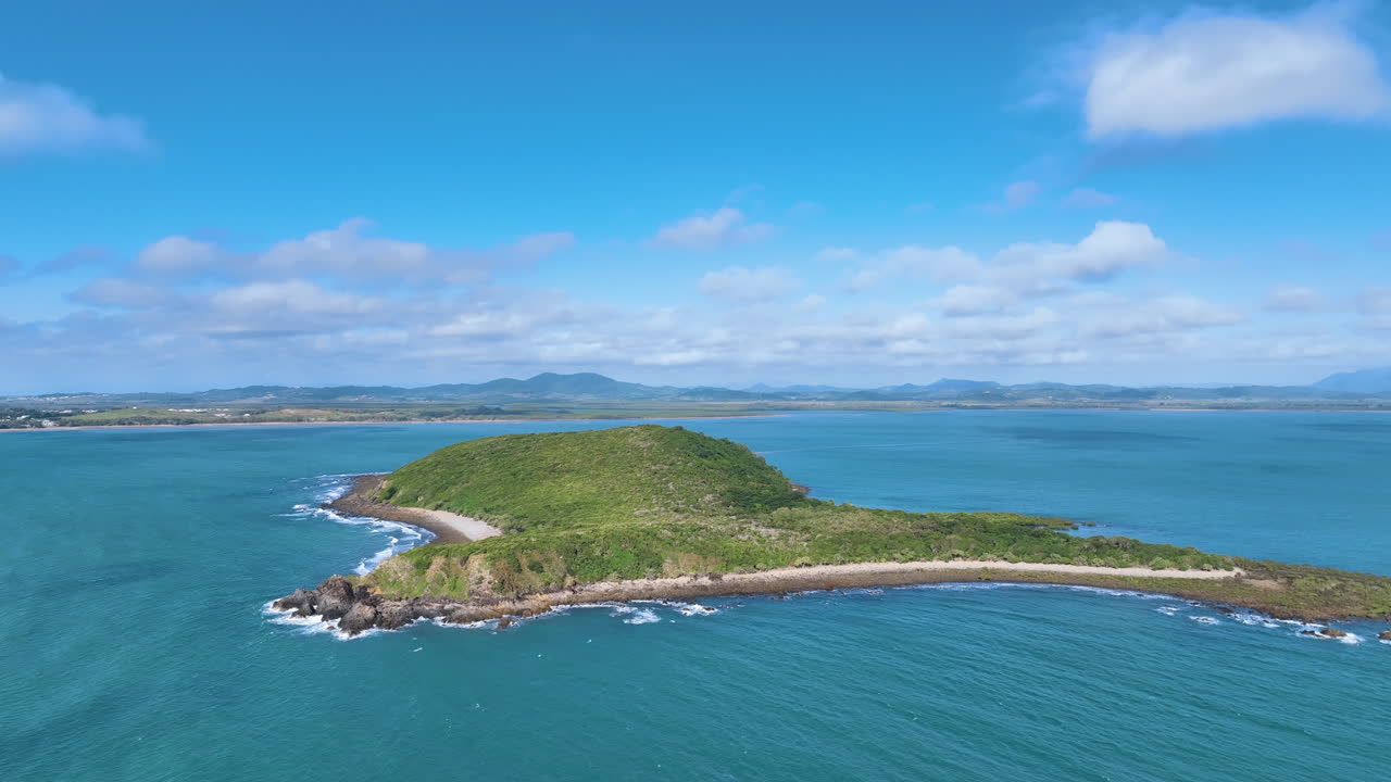 Flight along the tail of a unique fish shaped isle Little Green Island Australia