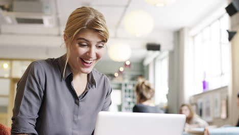 Successful-woman-arms-raised-celebrating-winning-poker-online