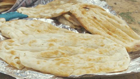 bread freshly baked in refugee camp