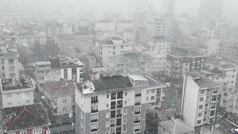 heavy snowfall over a cityscape