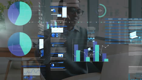 animation of financial data processing over african american businessman in office