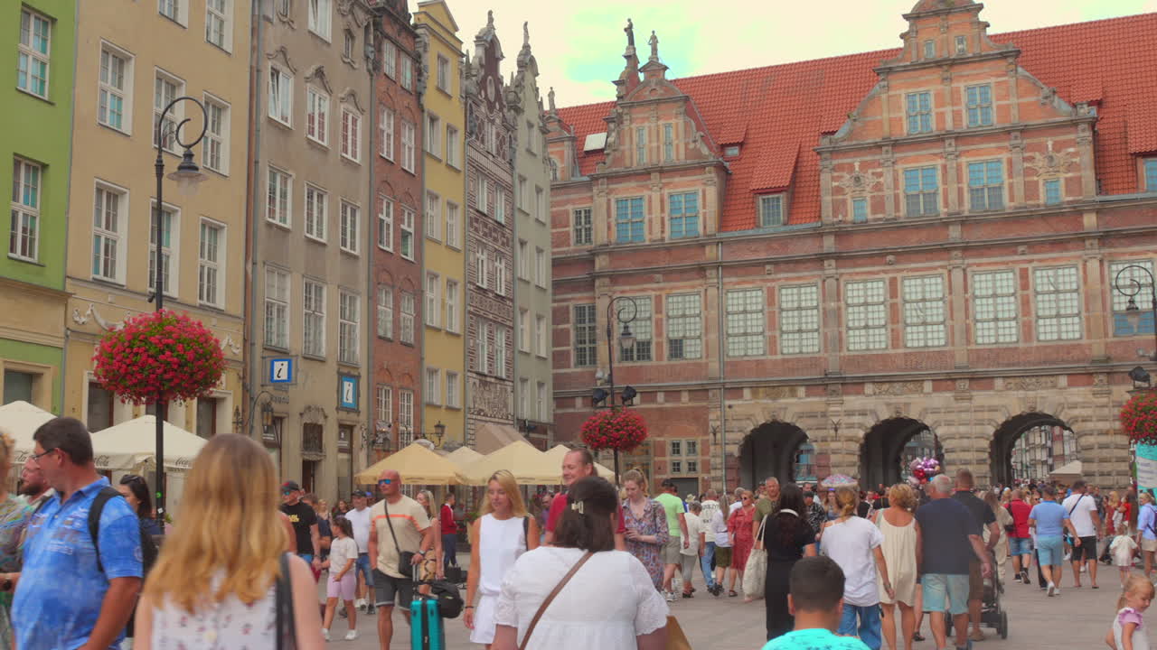 People walking peacefully in Gdansk old town at sunset, Poland