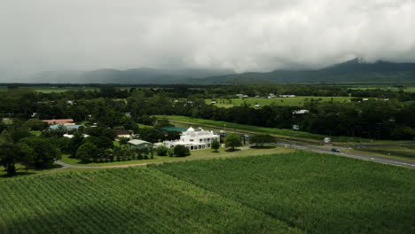 aerial view of a sikh temple in a sugarcane field