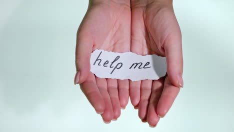 Hands-With-The-Inscription-Help-Me-On-A-White-Background