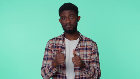 african american happy man in shirt showing thumbs up, nodding in approval, successful good work