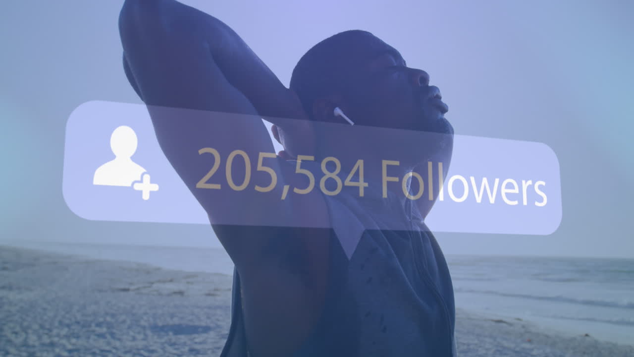 해변에서  ⁇ 어있는 아프리카계 미국인 남성 위의 미디어 아이콘의 애니메이션