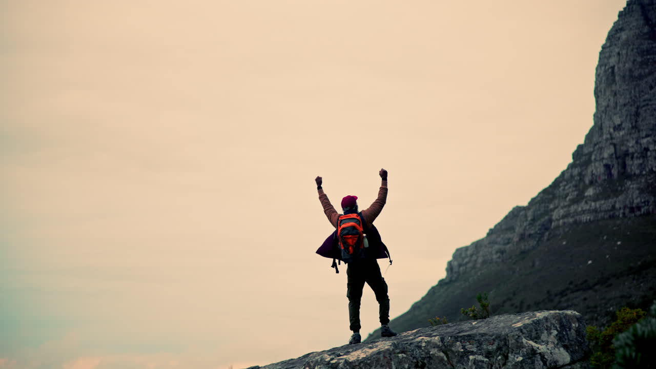 Man Hiker on Mountain Summit