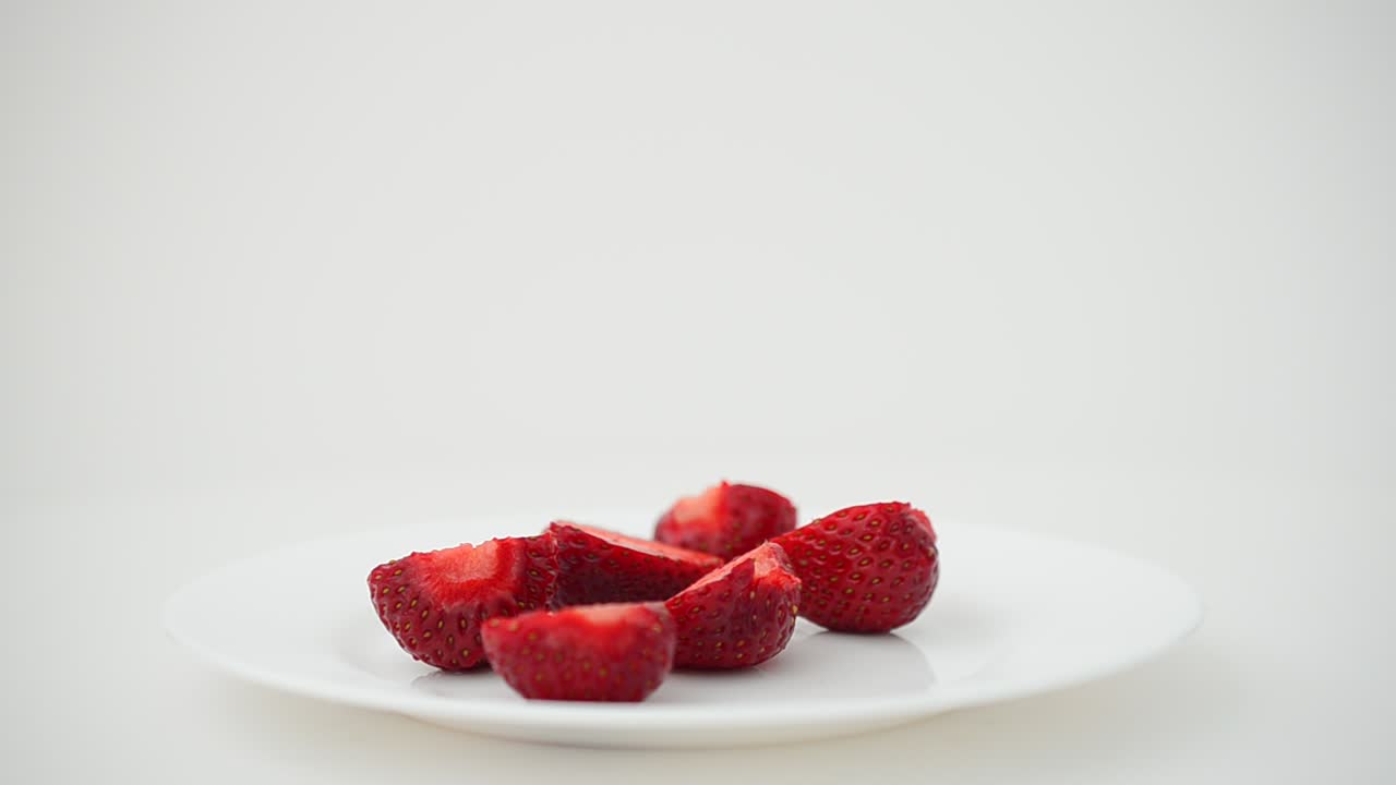 Strawberry on a white background, isolate. Shooting in the movement