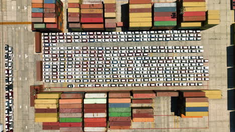 birds eye drone shot above the cars and containers at the port of mazatlan, mexico