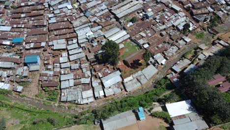 aerial shot looking straight down above vast overpopulated slums in kibera, nairobi, kenya, africa