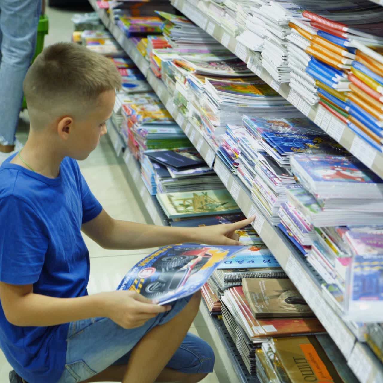 Vinnitsa, Ukraine - August, 2018: Purchase of school stationery in the store.