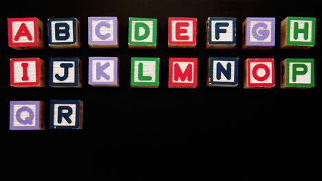 alphabet appearing in blocks