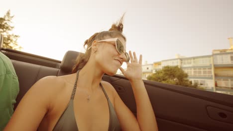woman in convertible