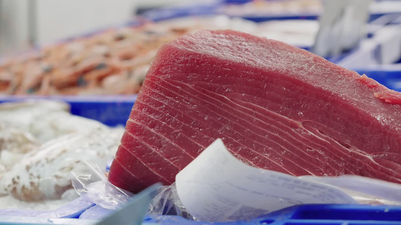 Close up of a piece of red tuna at the fishmonger's counter