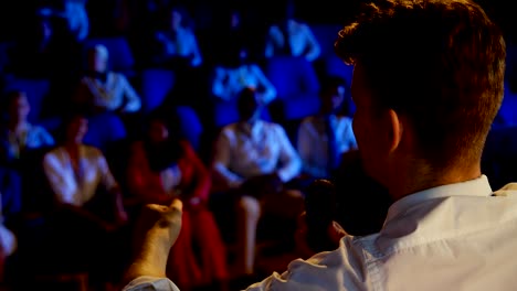 young caucasian businessman speaking in business seminar in auditorium 4k