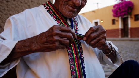 elderly man in traditional mexican clothing