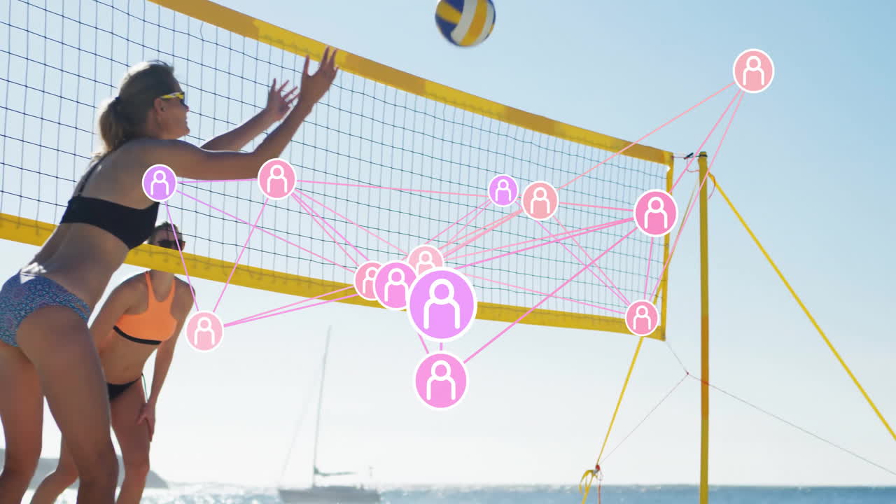 Playing beach volleyball, women with social network animation overlaid on net