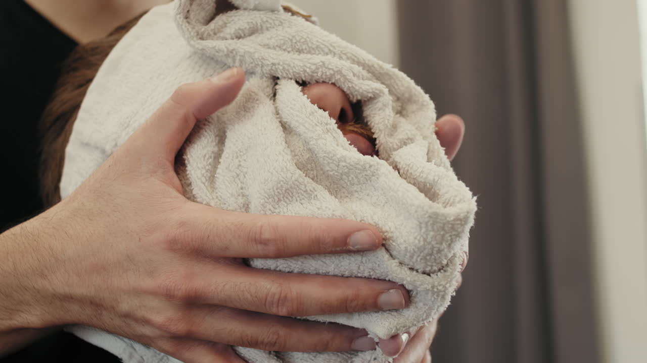 un paño cálido en la cara