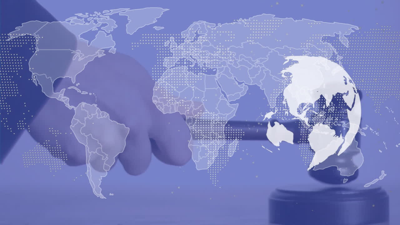 Animation of world map and globe over hand using gavel