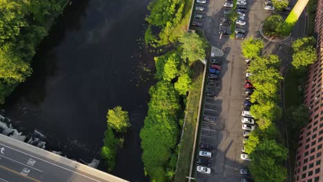 drone shot over bridge and river, city reveal 60fps