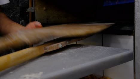 baking bread, baking bread putting raw dough oven