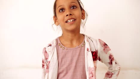 portrait of an indian child at home during coronavirus lockdown