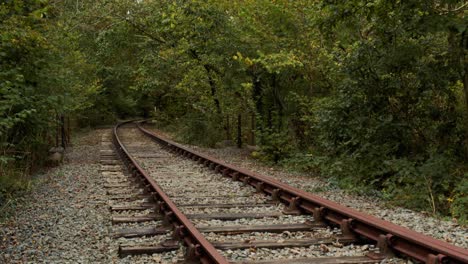 slow tilt shot of disused railway lines in langefni , anglesey, north wales in 4k