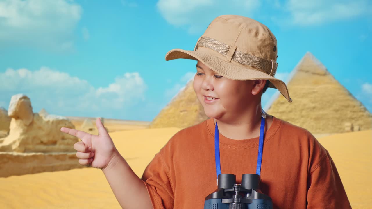 Smiling Boy Explorer in Desert with Pyramids