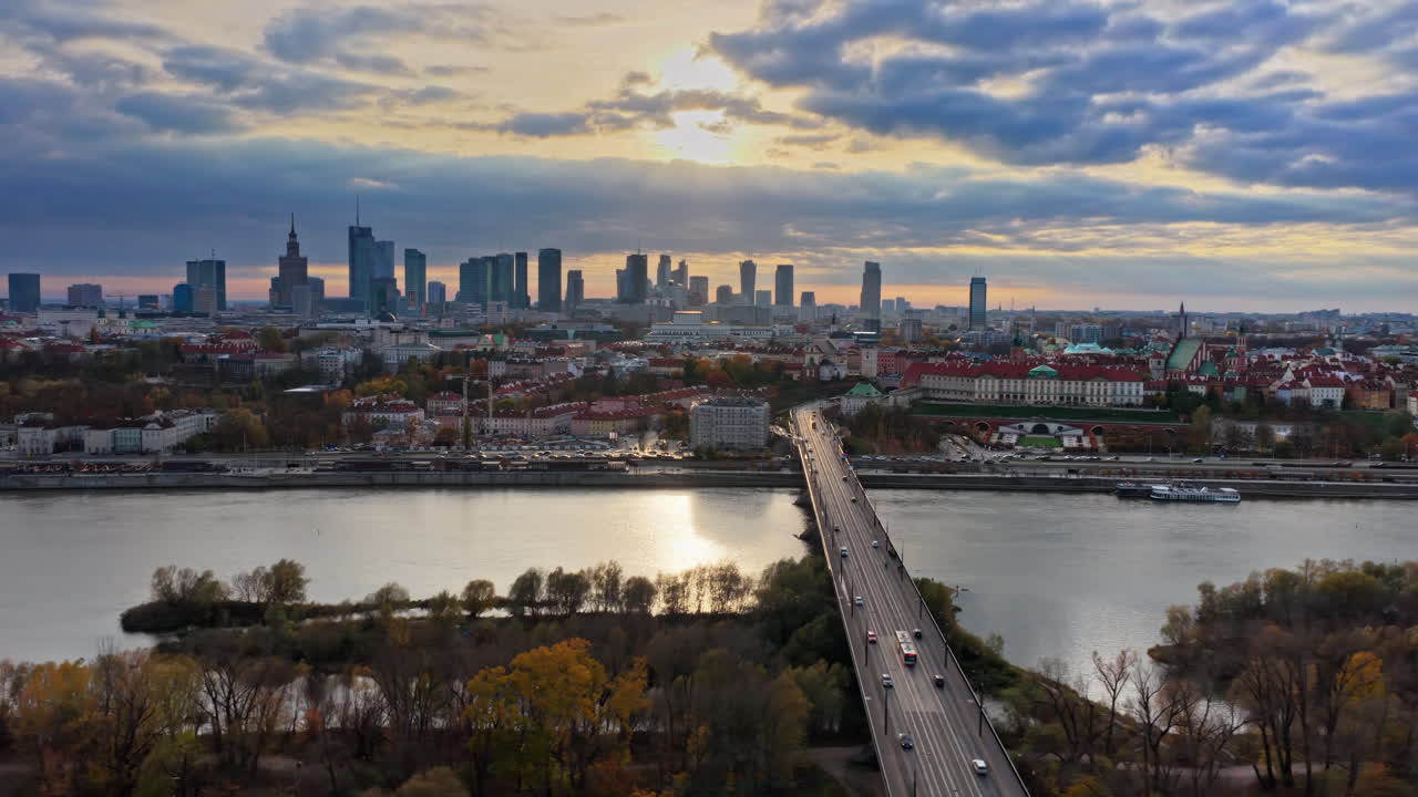 Aerial drone view the Vistula River and Warsaw's skyline with Swietokrzyski Bridge in view