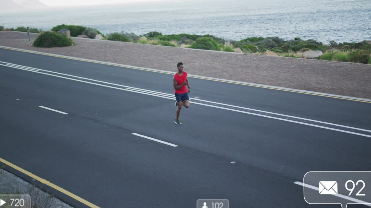 Male runner jogging ocean road, running causing social media alerts rising covering him training